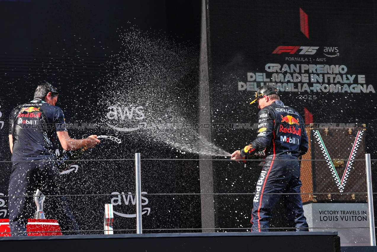 GP IMOLA, Gara winner Max Verstappen (NLD) Red Bull Racing (Right) celebrates on the podium with Enrico Balbo, Red Bull Racing Head of Aerodynamics.

18.05.2025. Formula 1 World Championship, Rd 7, Emilia Romagna Grand Prix, Imola, Italy, Gara Day.

- www.xpbimages.com, EMail: requests@xpbimages.com © Copyright: Charniaux / XPB Images