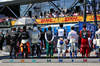 GP IMOLA, Drivers as the grid observes the national anthem.

18.05.2025. Formula 1 World Championship, Rd 7, Emilia Romagna Grand Prix, Imola, Italy, Gara Day.

- www.xpbimages.com, EMail: requests@xpbimages.com © Copyright: Batchelor / XPB Images