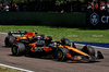 GP IMOLA, Oscar Piastri (AUS) McLaren MCL39 e Yuki Tsunoda (JPN) Red Bull Racing RB21 battle for position.

18.05.2025. Formula 1 World Championship, Rd 7, Emilia Romagna Grand Prix, Imola, Italy, Gara Day.

- www.xpbimages.com, EMail: requests@xpbimages.com © Copyright: Batchelor / XPB Images