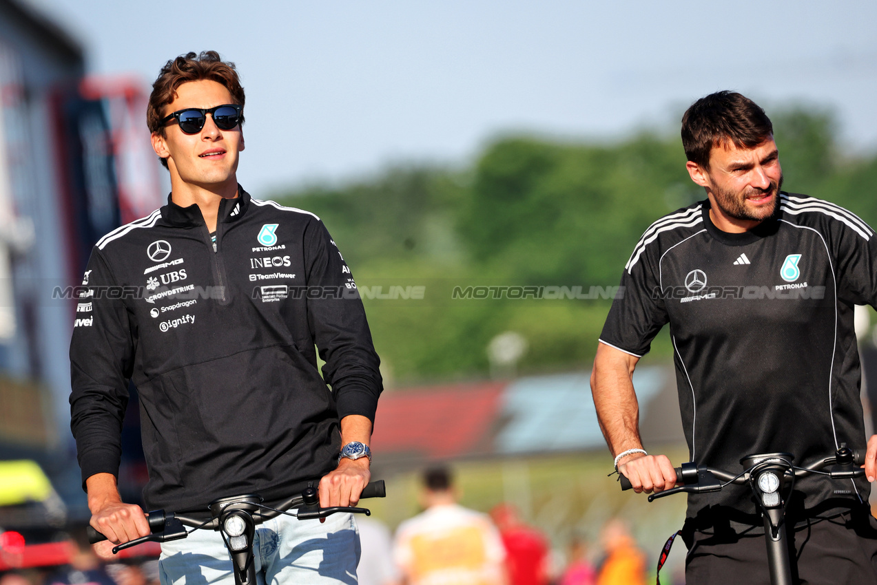 GP IMOLA, (L to R): George Russell (GBR) Mercedes AMG F1 with Aleix Casanovas, Mercedes AMG F1 Trainer.

15.05.2025. Formula 1 World Championship, Rd 7, Emilia Romagna Grand Prix, Imola, Italy, Preparation Day.

- www.xpbimages.com, EMail: requests@xpbimages.com © Copyright: Bearne / XPB Images