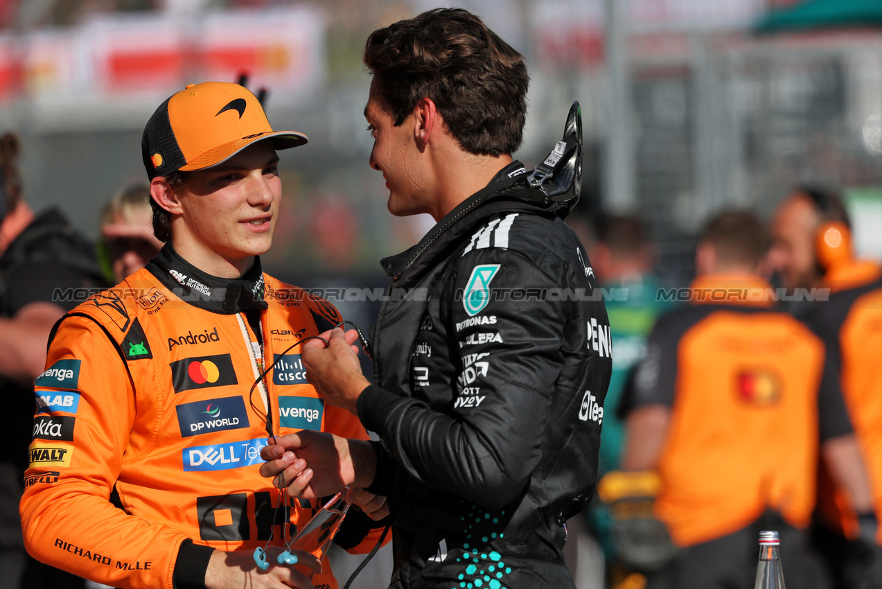 GP IMOLA, (L to R): Pole sitter Oscar Piastri (AUS) McLaren with thid placed George Russell (GBR) Mercedes AMG F1 in qualifying parc ferme.

17.05.2025. Formula 1 World Championship, Rd 7, Emilia Romagna Grand Prix, Imola, Italy, Qualifiche Day.

- www.xpbimages.com, EMail: requests@xpbimages.com © Copyright: Charniaux / XPB Images