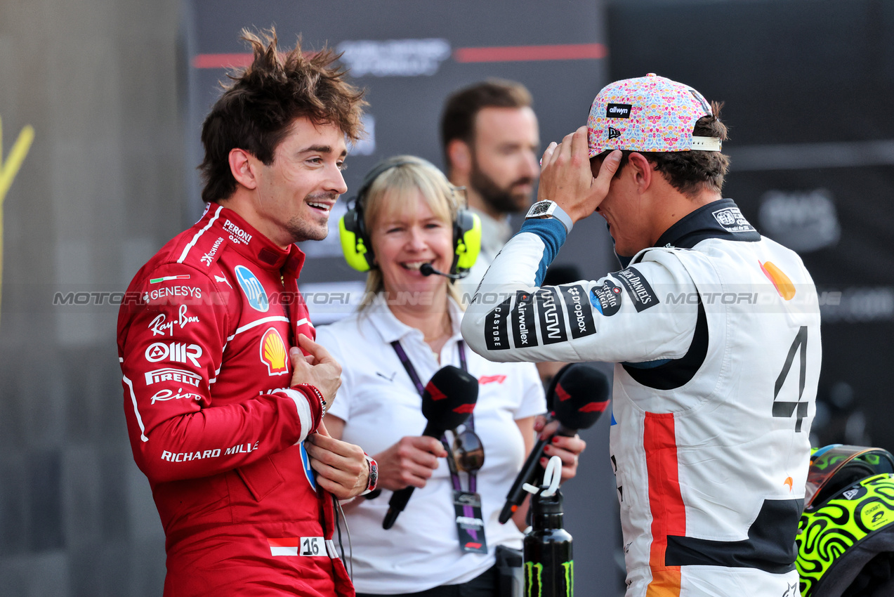 GP MESSICO, (L to R): Second placed Charles Leclerc (MON) Ferrari in qualifying parc ferme with pole sitter Lando Norris (GBR) McLaren.

25.10.2025. Formula 1 World Championship, Rd 20, Mexican Grand Prix, Mexico City, Mexico, Qualifiche Day.

- www.xpbimages.com, EMail: requests@xpbimages.com © Copyright: Charniaux / XPB Images