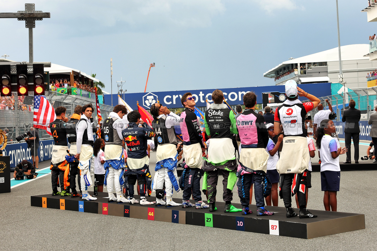 GP MIAMI, Drivers as the grid observes the national anthem.

04.05.2025. Formula 1 World Championship, Rd 6, Miami Grand Prix, Miami, Florida, USA, Gara Day.

- www.xpbimages.com, EMail: requests@xpbimages.com © Copyright: Bearne / XPB Images