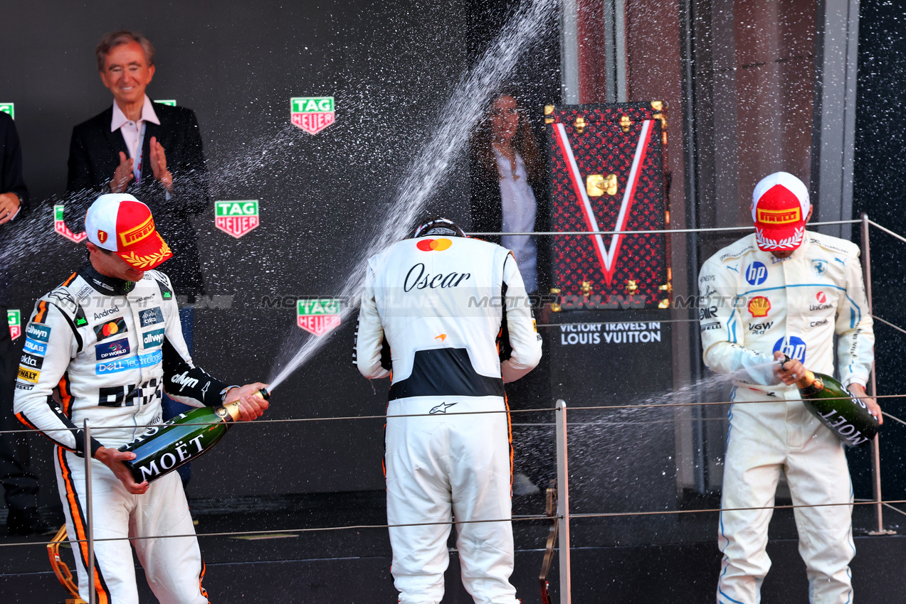 GP MONACO, (L to R): Gara winner Lando Norris (GBR) McLaren celebrates on the podium with Oscar Piastri (AUS) McLaren e Charles Leclerc (MON) Ferrari.

25.05.2025. Formula 1 World Championship, Rd 8, Monaco Grand Prix, Monte Carlo, Monaco, Gara Day.

- www.xpbimages.com, EMail: requests@xpbimages.com © Copyright: Batchelor / XPB Images