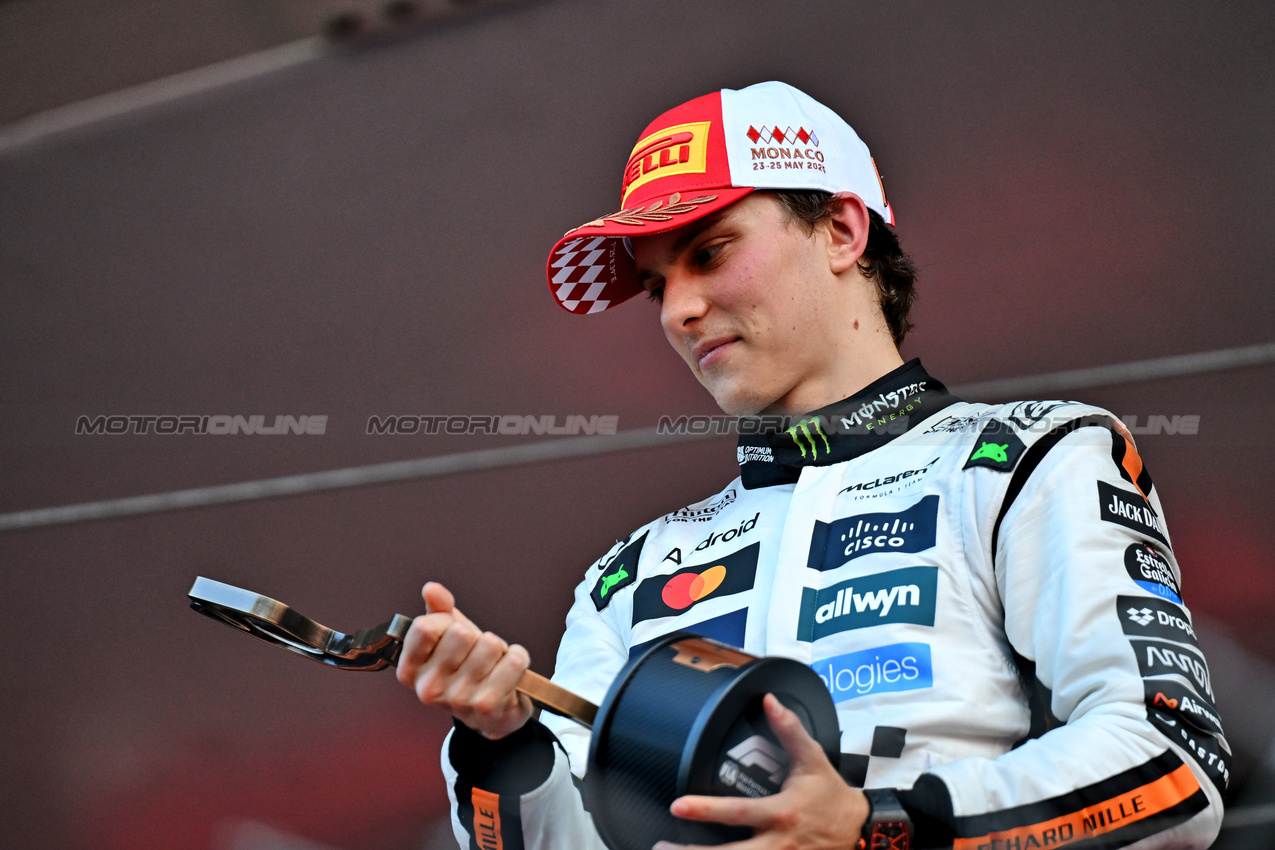 GP MONACO, Oscar Piastri (AUS) McLaren celebrates his third position on the podium.

25.05.2025. Formula 1 World Championship, Rd 8, Monaco Grand Prix, Monte Carlo, Monaco, Gara Day.

- www.xpbimages.com, EMail: requests@xpbimages.com © Copyright: Price / XPB Images