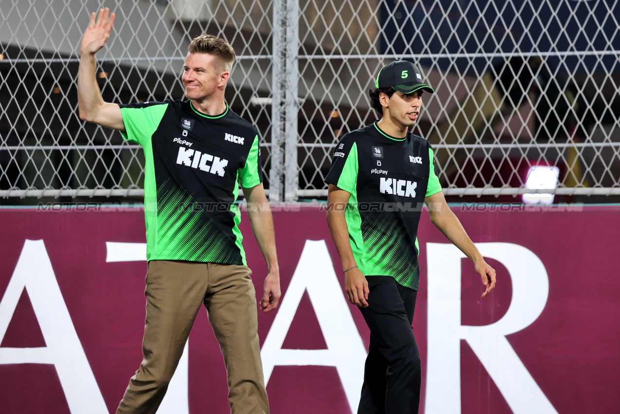 GP QATAR, (L to R): Nico Hulkenberg (GER) Sauber e Gabriel Bortoleto (BRA) Sauber on the drivers' parade.

30.11.2025. Formula 1 World Championship, Rd 23, Qatar Grand Prix, Doha, Qatar, Gara Day.

- www.xpbimages.com, EMail: requests@xpbimages.com © Copyright: Charniaux / XPB Images