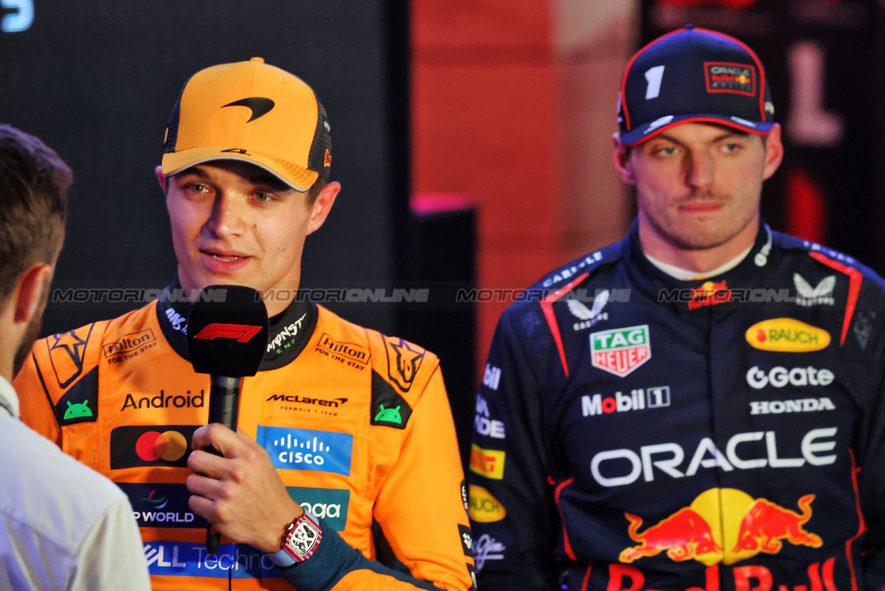 GP QATAR, (L to R): Lando Norris (GBR) McLaren e Max Verstappen (NLD) Red Bull Racing in qualifying parc ferme.

29.11.2025. Formula 1 World Championship, Rd 23, Qatar Grand Prix, Doha, Qatar, Sprint e Qualifiche Day.

- www.xpbimages.com, EMail: requests@xpbimages.com © Copyright: Charniaux / XPB Images