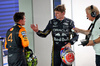 GP SINGAPORE, (L to R): Lando Norris (GBR) McLaren celebrates his third position in parc ferme with second placed Max Verstappen (NLD) Red Bull Racing.

05.10.2025. Formula 1 World Championship, Rd 18, Singapore Grand Prix, Marina Bay Street Circuit, Singapore, Gara Day.

- www.xpbimages.com, EMail: requests@xpbimages.com © Copyright: Batchelor / XPB Images