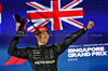 GP SINGAPORE, Gara winner George Russell (GBR) Mercedes AMG F1 celebrates on the podium.

05.10.2025. Formula 1 World Championship, Rd 18, Singapore Grand Prix, Marina Bay Street Circuit, Singapore, Gara Day.

- www.xpbimages.com, EMail: requests@xpbimages.com © Copyright: Batchelor / XPB Images