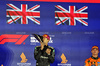 GP SINGAPORE, Gara winner George Russell (GBR) Mercedes AMG F1 celebrates on the podium.

05.10.2025. Formula 1 World Championship, Rd 18, Singapore Grand Prix, Marina Bay Street Circuit, Singapore, Gara Day.

- www.xpbimages.com, EMail: requests@xpbimages.com © Copyright: Bearne / XPB Images