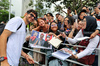 GP SINGAPORE, Esteban Ocon (FRA) Haas F1 Team with fans.

02.10.2025. Formula 1 World Championship, Rd 18, Singapore Grand Prix, Marina Bay Street Circuit, Singapore, Preparation Day.

- www.xpbimages.com, EMail: requests@xpbimages.com © Copyright: Moy / XPB Images