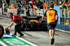 GP SINGAPORE, Lando Norris (GBR) McLaren MCL39 in the pits after colliding with Charles Leclerc (MON) Ferrari SF-25 in the second practice session.

03.10.2025. Formula 1 World Championship, Rd 18, Singapore Grand Prix, Marina Bay Street Circuit, Singapore, Practice Day.

- www.xpbimages.com, EMail: requests@xpbimages.com © Copyright: Batchelor / XPB Images