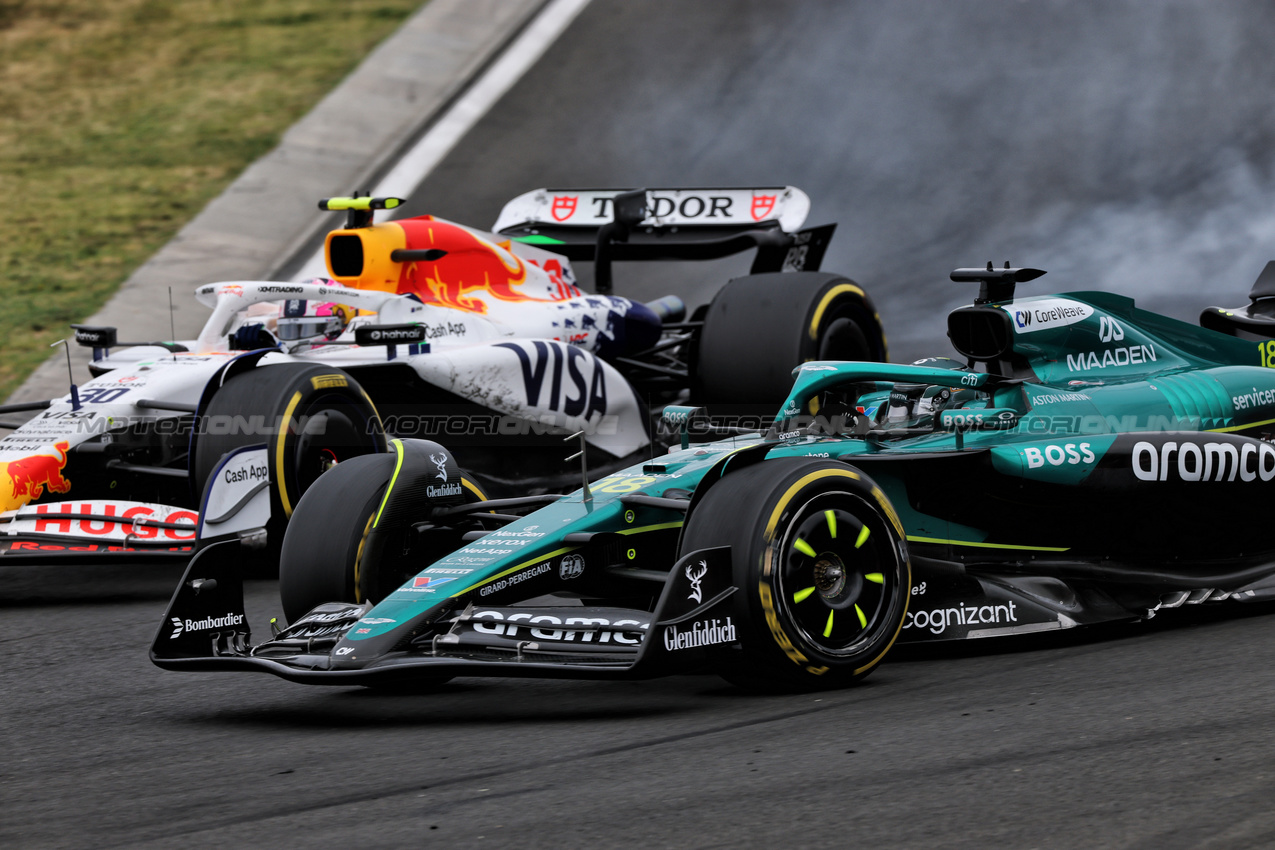 GP UNGHERIA, Lance Stroll (CDN) Aston Martin F1 Team AMR25 e Liam Lawson (NZL) Racing Bulls VCARB 02 battle for position.

03.08.2025. Formula 1 World Championship, Rd 14, Hungarian Grand Prix, Budapest, Hungary, Gara Day.

- www.xpbimages.com, EMail: requests@xpbimages.com © Copyright: Charniaux / XPB Images