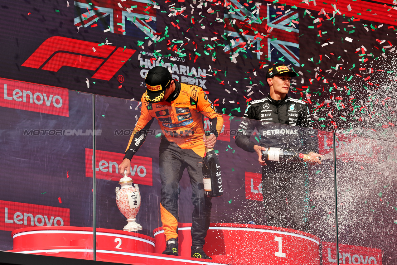 GP UNGHERIA, Gara winner Lando Norris (GBR) McLaren celebrates on the podium.

03.08.2025. Formula 1 World Championship, Rd 14, Hungarian Grand Prix, Budapest, Hungary, Gara Day.

- www.xpbimages.com, EMail: requests@xpbimages.com © Copyright: Moy / XPB Images