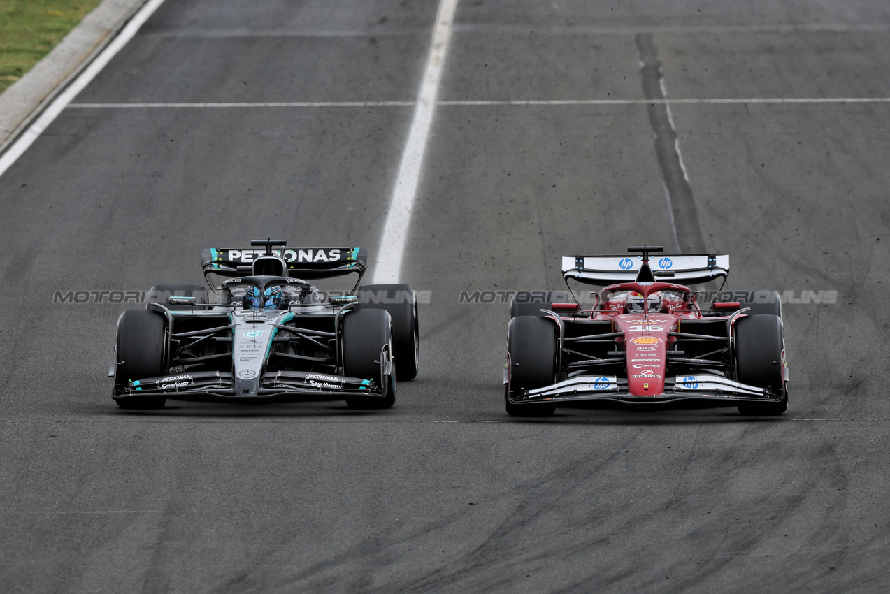 GP UNGHERIA, Charles Leclerc (MON) Ferrari SF-25 e George Russell (GBR) Mercedes AMG F1 W16 battle for position.

03.08.2025. Formula 1 World Championship, Rd 14, Hungarian Grand Prix, Budapest, Hungary, Gara Day.

- www.xpbimages.com, EMail: requests@xpbimages.com © Copyright: Charniaux / XPB Images