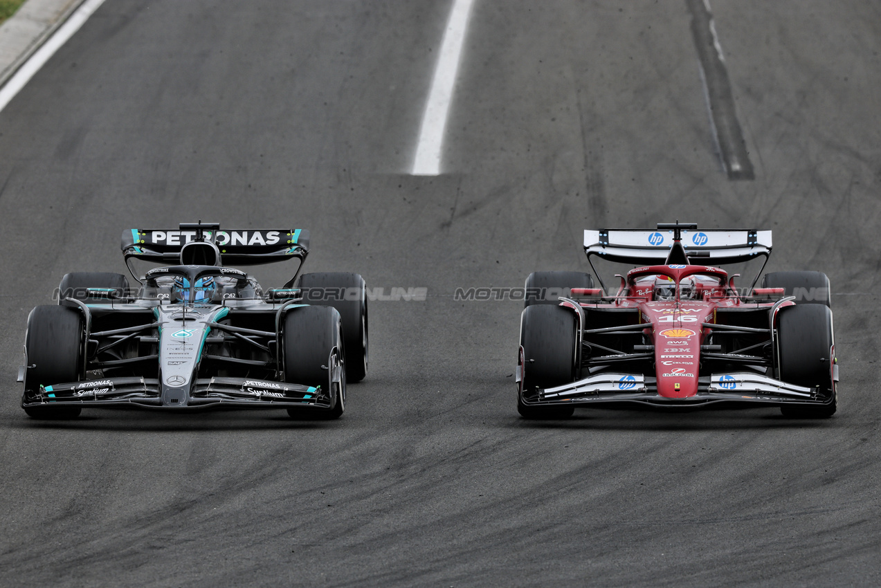 GP UNGHERIA, Charles Leclerc (MON) Ferrari SF-25 e George Russell (GBR) Mercedes AMG F1 W16 battle for position.

03.08.2025. Formula 1 World Championship, Rd 14, Hungarian Grand Prix, Budapest, Hungary, Gara Day.

- www.xpbimages.com, EMail: requests@xpbimages.com © Copyright: Charniaux / XPB Images