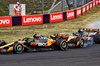 GP UNGHERIA, Lando Norris (GBR) McLaren MCL39 e team mate Oscar Piastri (AUS) McLaren MCL39 battle for the lead of the race.

03.08.2025. Formula 1 World Championship, Rd 14, Hungarian Grand Prix, Budapest, Hungary, Gara Day.

- www.xpbimages.com, EMail: requests@xpbimages.com © Copyright: Charniaux / XPB Images