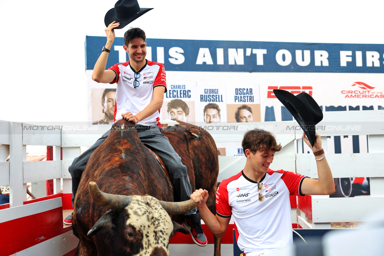 GP USA, (L to R): Esteban Ocon (FRA) Haas F1 Team with team mate Oliver Bearman (GBR) Haas F1 Team - Paddock Rodeo.
16.10.2025. Formula 1 World Championship, Rd 19, United States Grand Prix, Austin, Texas, USA, Preparation Day.
- www.xpbimages.com, EMail: requests@xpbimages.com © Copyright: Rew / XPB Images