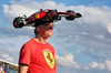 GP USA, Circuit Atmosfera - Ferrari fan with a car hat.

16.10.2025. Formula 1 World Championship, Rd 19, United States Grand Prix, Austin, Texas, USA, Preparation Day.

- www.xpbimages.com, EMail: requests@xpbimages.com © Copyright: Moy / XPB Images