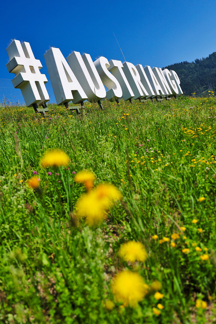 GP AUSTRIA, Circuit Atmosfera - #AustrianGP sign trackside.
25.06.2026. Formula 1 World Championship, Rd 8, Austrian Grand Prix, Spielberg, Austria, Preparation Day.
- www.xpbimages.com, EMail: requests@xpbimages.com © Copyright: Moy / XPB Images