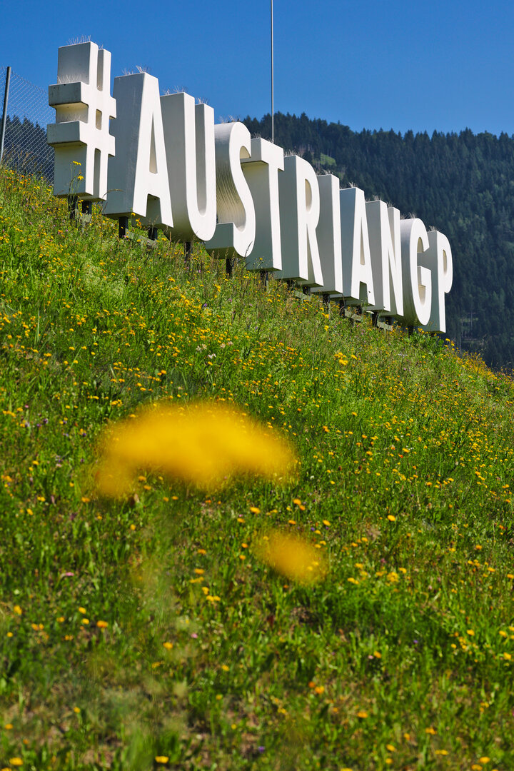 GP AUSTRIA, Circuit Atmosfera - #AustrianGP sign trackside.
25.06.2026. Formula 1 World Championship, Rd 8, Austrian Grand Prix, Spielberg, Austria, Preparation Day.
- www.xpbimages.com, EMail: requests@xpbimages.com © Copyright: Moy / XPB Images
