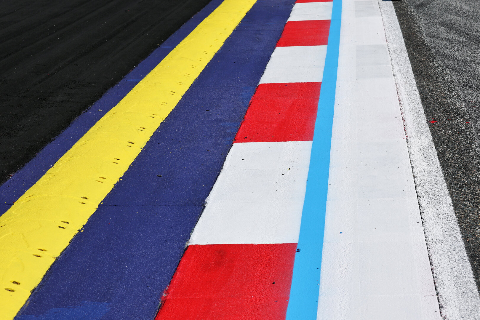 GP AUSTRIA, Circuit Atmosfera - kerb detail.
25.06.2026. Formula 1 World Championship, Rd 8, Austrian Grand Prix, Spielberg, Austria, Preparation Day.
- www.xpbimages.com, EMail: requests@xpbimages.com © Copyright: Moy / XPB Images
