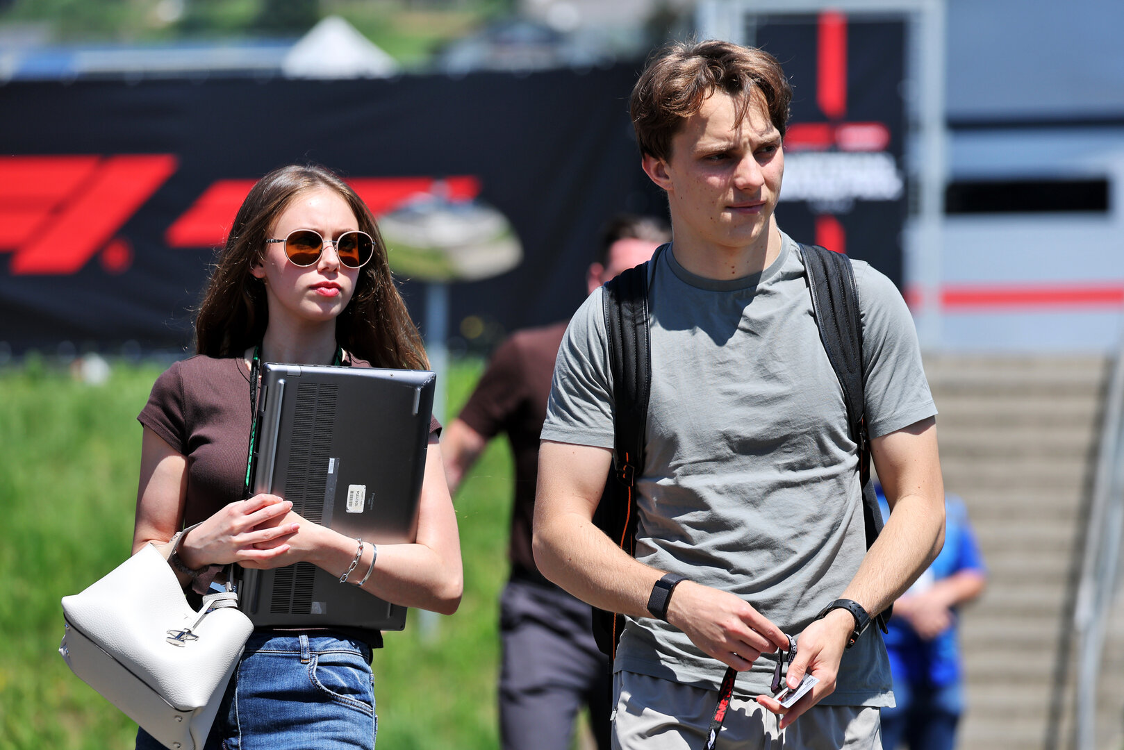 GP AUSTRIA, (L to R): Lily Zneimer (GBR) with her boyfriend Oscar Piastri (AUS) McLaren F1 Team.
25.06.2026. Formula 1 World Championship, Rd 8, Austrian Grand Prix, Spielberg, Austria, Preparation Day.
- www.xpbimages.com, EMail: requests@xpbimages.com © Copyright: Moy / XPB Images