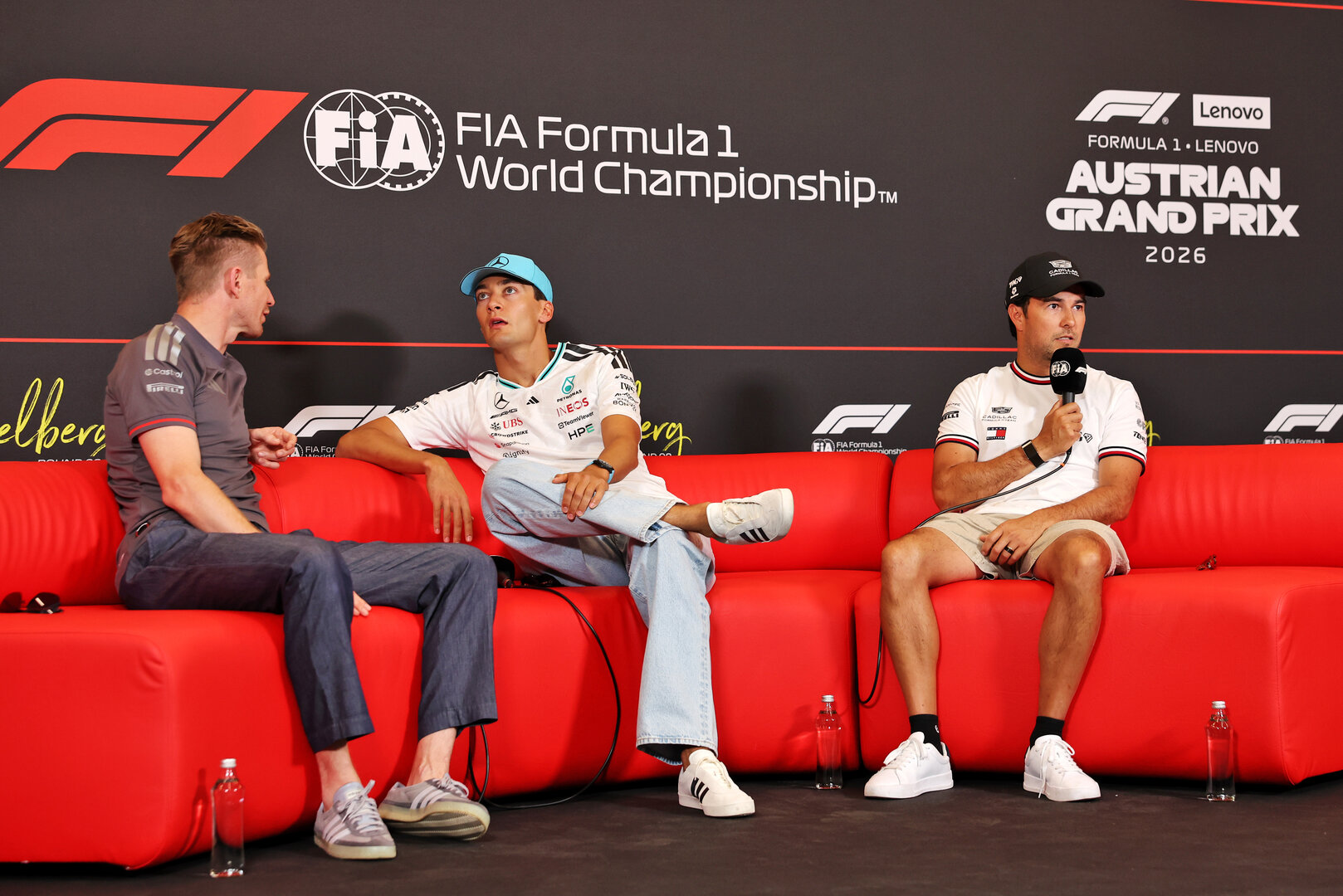 GP AUSTRIA, (L to R): Nico Hulkenberg (GER) Audi F1 Team; George Russell (GBR) Mercedes AMG Formula One Team; e Sergio Perez (MEX) Cadillac Formula 1 Team, in the FIA Press Conference.
25.06.2026. Formula 1 World Championship, Rd 8, Austrian Grand Prix, Spielberg, Austria, Preparation Day.
- www.xpbimages.com, EMail: requests@xpbimages.com © Copyright: Bearne / XPB Images