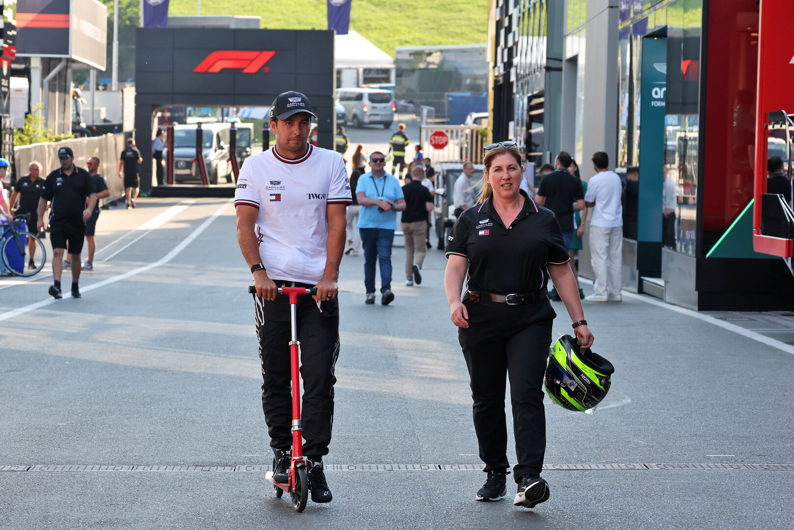 GP AUSTRIA, (L to R): Sergio Perez (MEX) Cadillac Formula 1 Team with Lucy Genon (GBR) Cadillac Formula 1 Team Head of Communications.
25.06.2026. Formula 1 World Championship, Rd 8, Austrian Grand Prix, Spielberg, Austria, Preparation Day.
- www.xpbimages.com, EMail: requests@xpbimages.com © Copyright: Moy / XPB Images