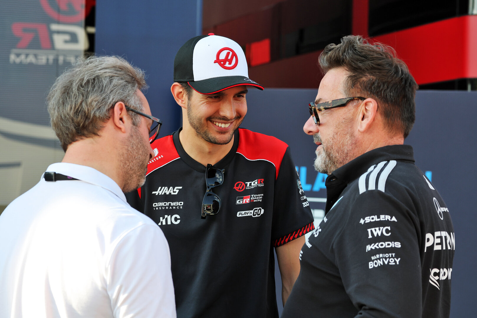 GP AUSTRIA, Esteban Ocon (FRA) Haas F1 Team (Centre) with Gwen Lagrue, Head of Mercedes AMG Driver Development (Right).
25.06.2026. Formula 1 World Championship, Rd 8, Austrian Grand Prix, Spielberg, Austria, Preparation Day.
- www.xpbimages.com, EMail: requests@xpbimages.com © Copyright: Moy / XPB Images