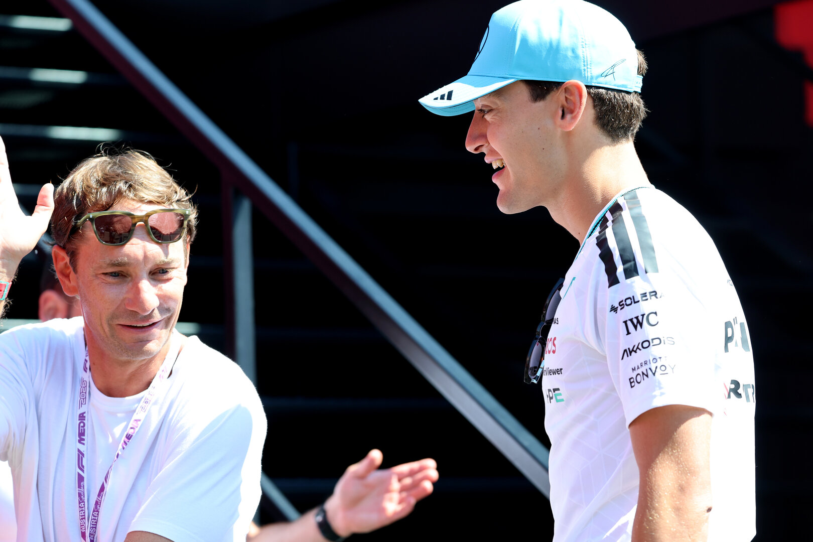 GP AUSTRIA, (L to R): Mathias Lauda (AUT) with George Russell (GBR) Mercedes AMG Formula One Team.
26.06.2026. Formula 1 World Championship, Rd 8, Austrian Grand Prix, Spielberg, Austria, Practice Day.
- www.xpbimages.com, EMail: requests@xpbimages.com © Copyright: Batchelor / XPB Images