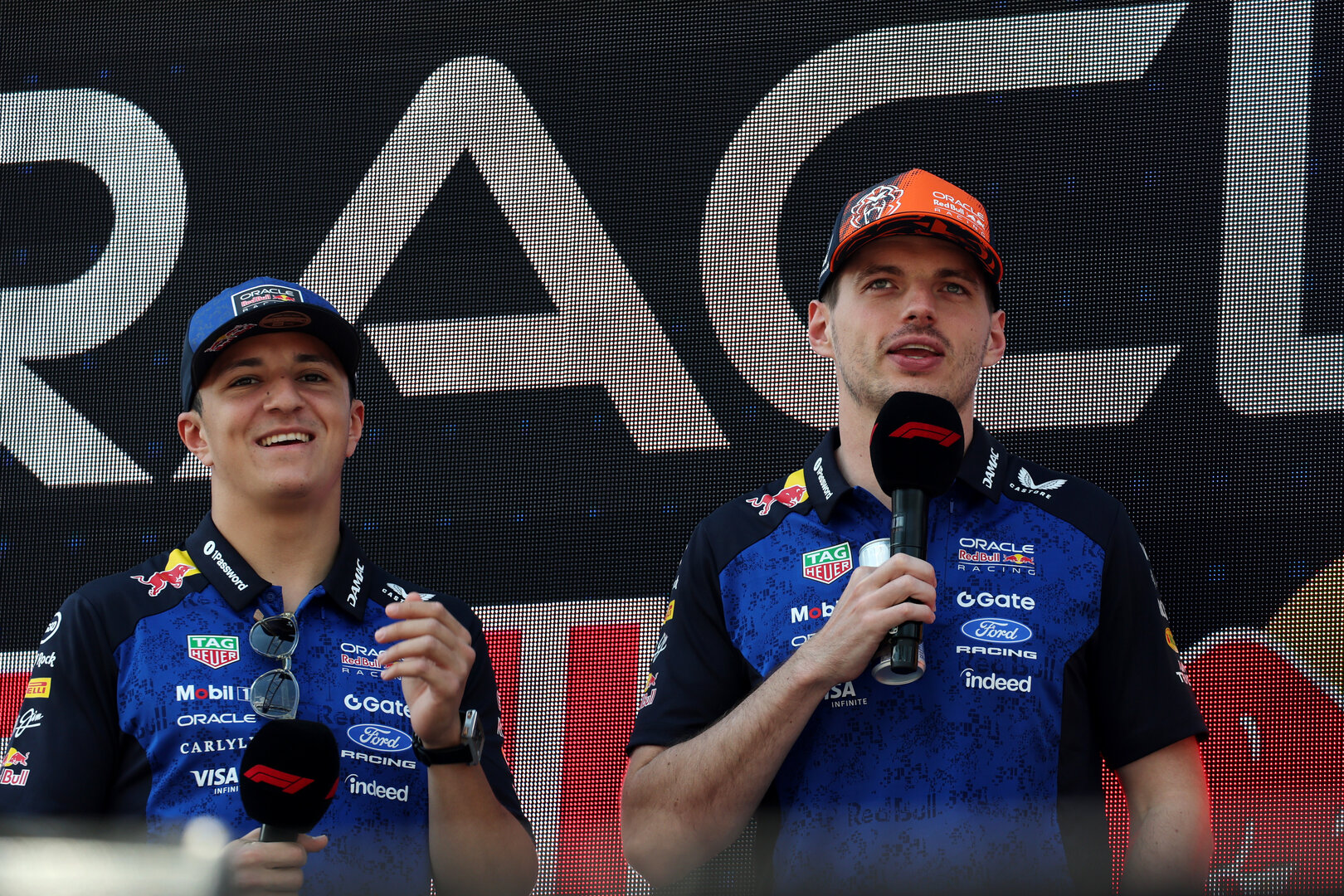 GP AUSTRIA, Max Verstappen (NLD) Red Bull Racing e Isack Hadjar (FRA) Red Bull Racing on the FanZone Stage.
26.06.2026. Formula 1 World Championship, Rd 8, Austrian Grand Prix, Spielberg, Austria, Practice Day.
- www.xpbimages.com, EMail: requests@xpbimages.com © Copyright: Moy / XPB Images