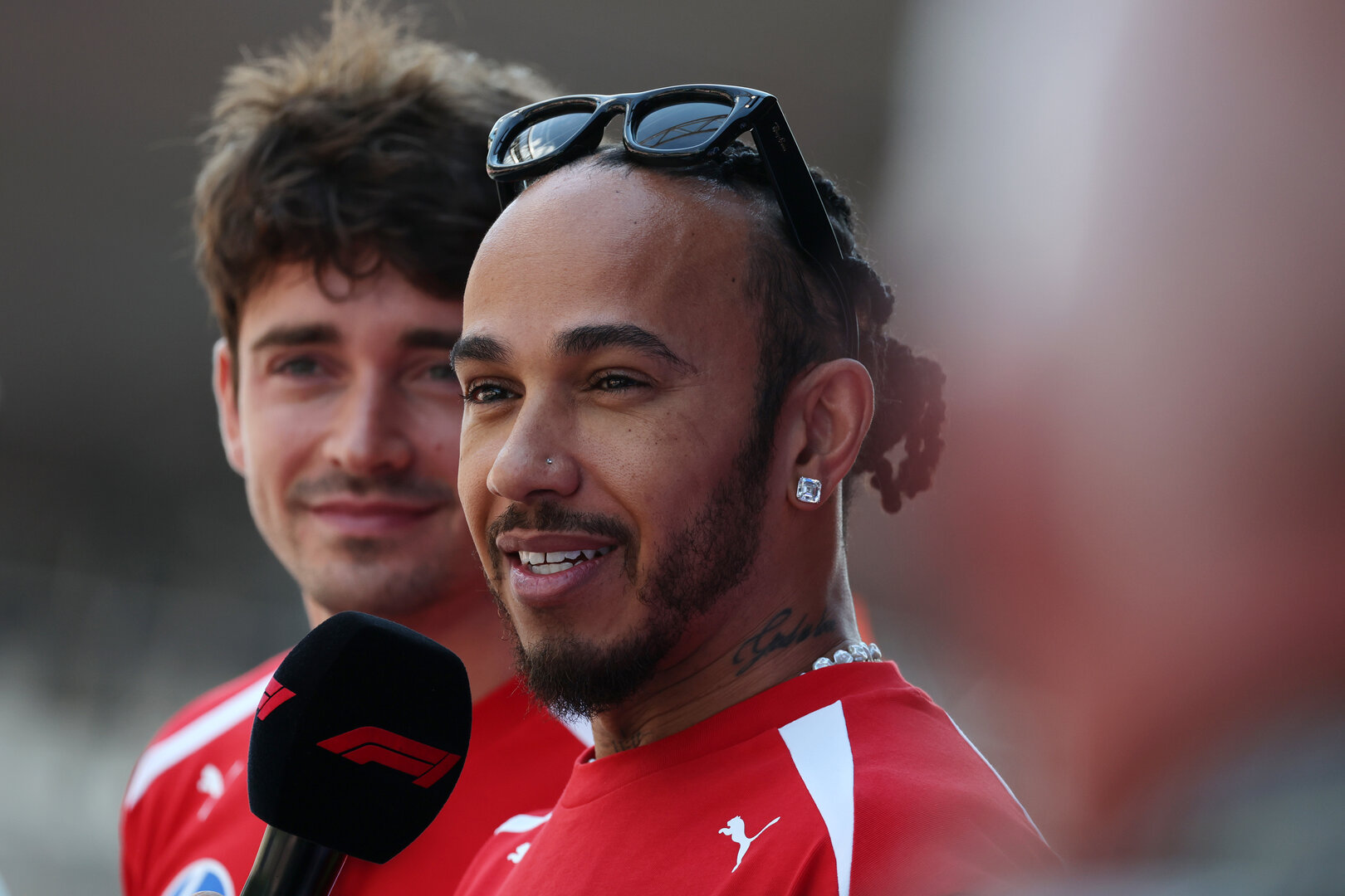 GP AUSTRIA, Lewis Hamilton (GBR) Ferrari e Charles Leclerc (MON) Ferrari on the FanZone Stage.
26.06.2026. Formula 1 World Championship, Rd 8, Austrian Grand Prix, Spielberg, Austria, Practice Day.
- www.xpbimages.com, EMail: requests@xpbimages.com © Copyright: Moy / XPB Images
