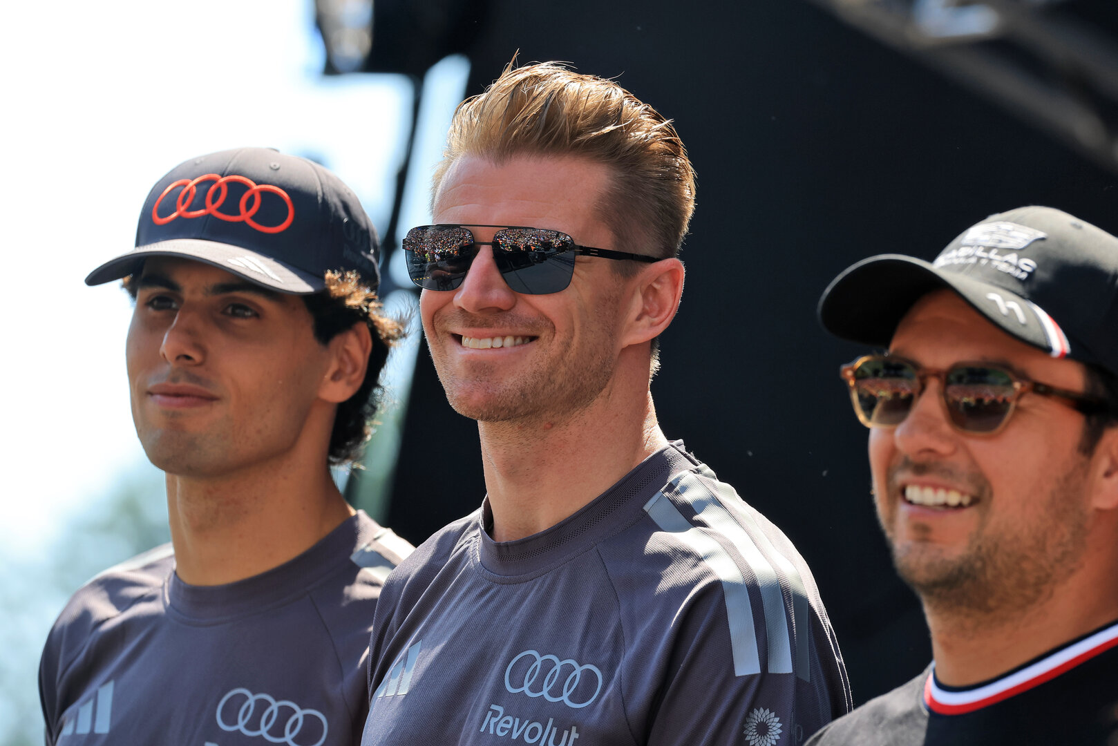 GP AUSTRIA, Nico Hulkenberg (GER) Audi F1 Team (Centre) with team mate Gabriel Bortoleto (BRA) Audi F1 Team (Left) e Sergio Perez (MEX) Cadillac Formula 1 Team (Right) on the FanZone Stage.
27.06.2026. Formula 1 World Championship, Rd 8, Austrian Grand Prix, Spielberg, Austria, Qualifiche Day.
- www.xpbimages.com, EMail: requests@xpbimages.com © Copyright: Moy / XPB Images