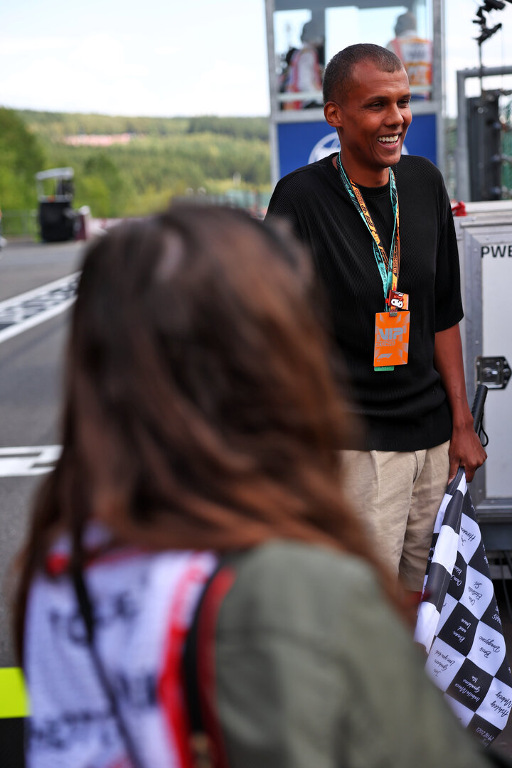 GP BELGIO, Stromae (BEL) Singer e Rapper with the chequered flag at the end of the race.
19.07.2026. Formula 1 World Championship, Rd 10, Belgian Grand Prix, Spa Francorchamps, Belgium, Gara Day.
 - www.xpbimages.com, EMail: requests@xpbimages.com © Copyright: Patching / XPB Images