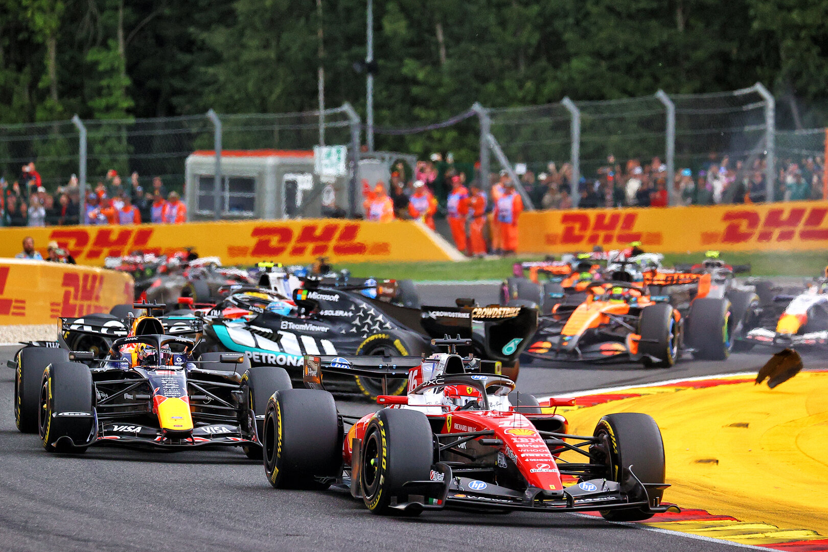 GP BELGIO, Charles Leclerc (MON) Ferrari SF-26 as George Russell (GBR) Mercedes AMG Formula One Team W17 crashes out at the partenza of the race.
19.07.2026. Formula 1 World Championship, Rd 10, Belgian Grand Prix, Spa Francorchamps, Belgium, Gara Day.
- www.xpbimages.com, EMail: requests@xpbimages.com © Copyright: XPB Images