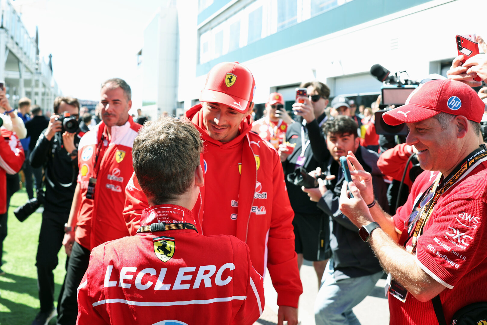GP CANADA, Charles Leclerc (MON) Ferrari with a young fan.
22.05.2026. Formula 1 World Championship, Rd 5, Canadian Grand Prix, Montreal, Canada, Sprint Qualifiche Day.
- www.xpbimages.com, EMail: requests@xpbimages.com © Copyright: Bearne / XPB Images
