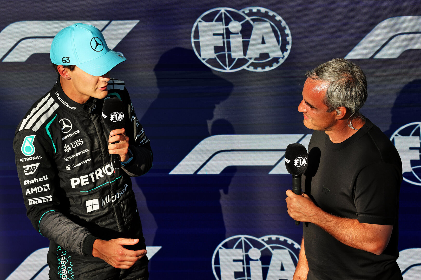 GP CANADA, (L to R): Pole sitter George Russell (GBR) Mercedes AMG Formula One Team in Sprint Qualifiche parc ferme with Juan Pablo Montoya (COL).
22.05.2026. Formula 1 World Championship, Rd 5, Canadian Grand Prix, Montreal, Canada, Sprint Qualifiche Day.
- www.xpbimages.com, EMail: requests@xpbimages.com © Copyright: Batchelor / XPB Images