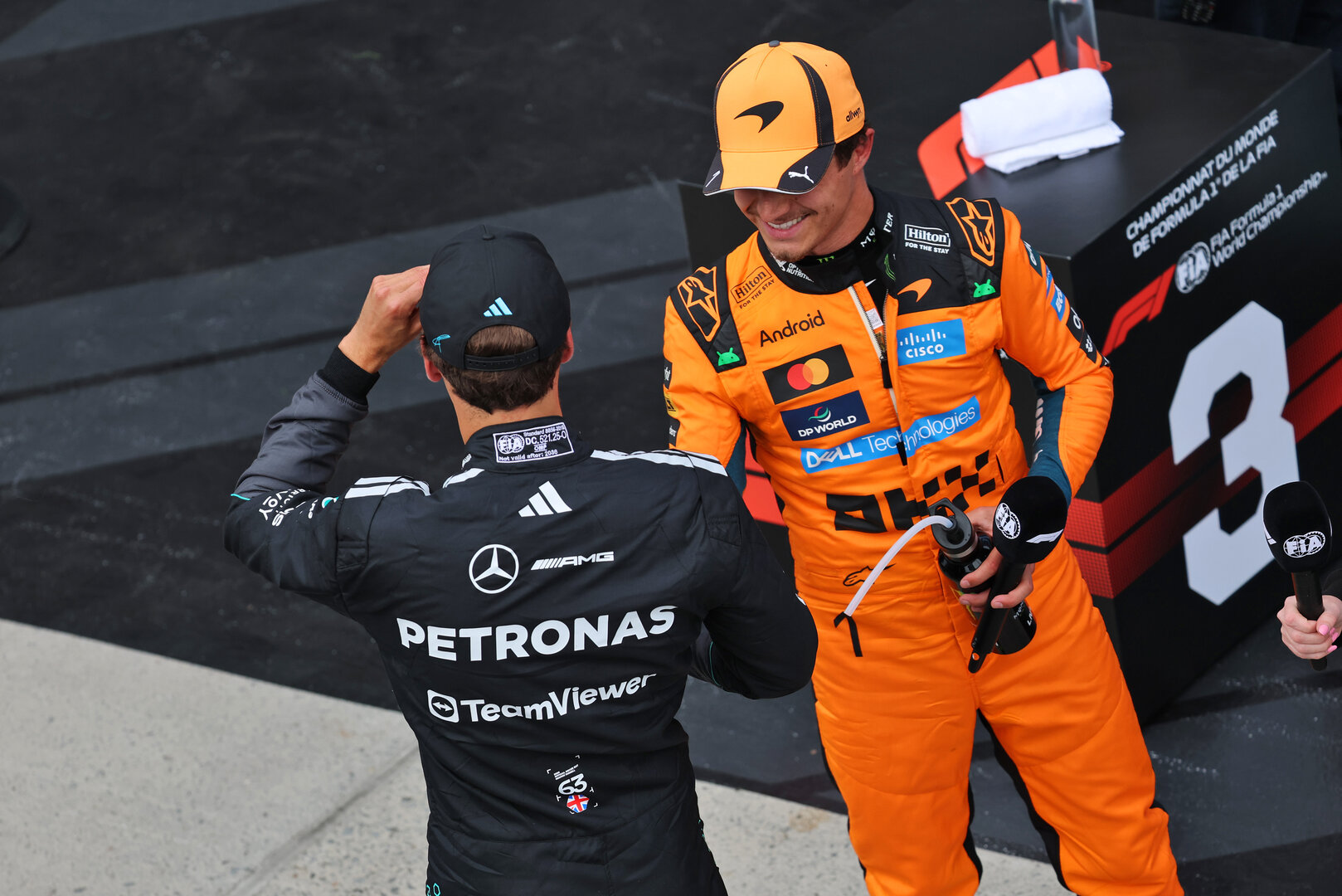 GP CANADA, (L to R): George Russell (GBR) Mercedes AMG Formula One Team celebrates his pole position in qualifying parc ferme with third placed Lando Norris (GBR) McLaren F1 Team.
23.05.2026. Formula 1 World Championship, Rd 5, Canadian Grand Prix, Montreal, Canada, Sprint e Qualifiche Day.
- www.xpbimages.com, EMail: requests@xpbimages.com © Copyright: Batchelor / XPB Images