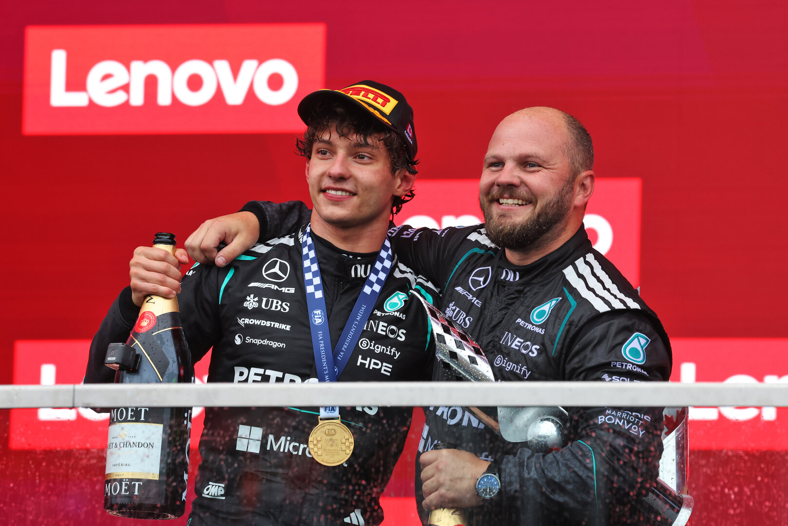 GP CANADA, (L to R): Gara winner Andrea Kimi Antonelli (ITA) Mercedes AMG Formula One Team celebrates on the podium with Dean Hale (GBR) Mercedes AMG F1 Formula One Team Senior Travelling Composite Technician.
24.05.2026. Formula 1 World Championship, Rd 5, Canadian Grand Prix, Montreal, Canada, Gara Day.
 - www.xpbimages.com, EMail: requests@xpbimages.com © Copyright: Dunbar / XPB Images