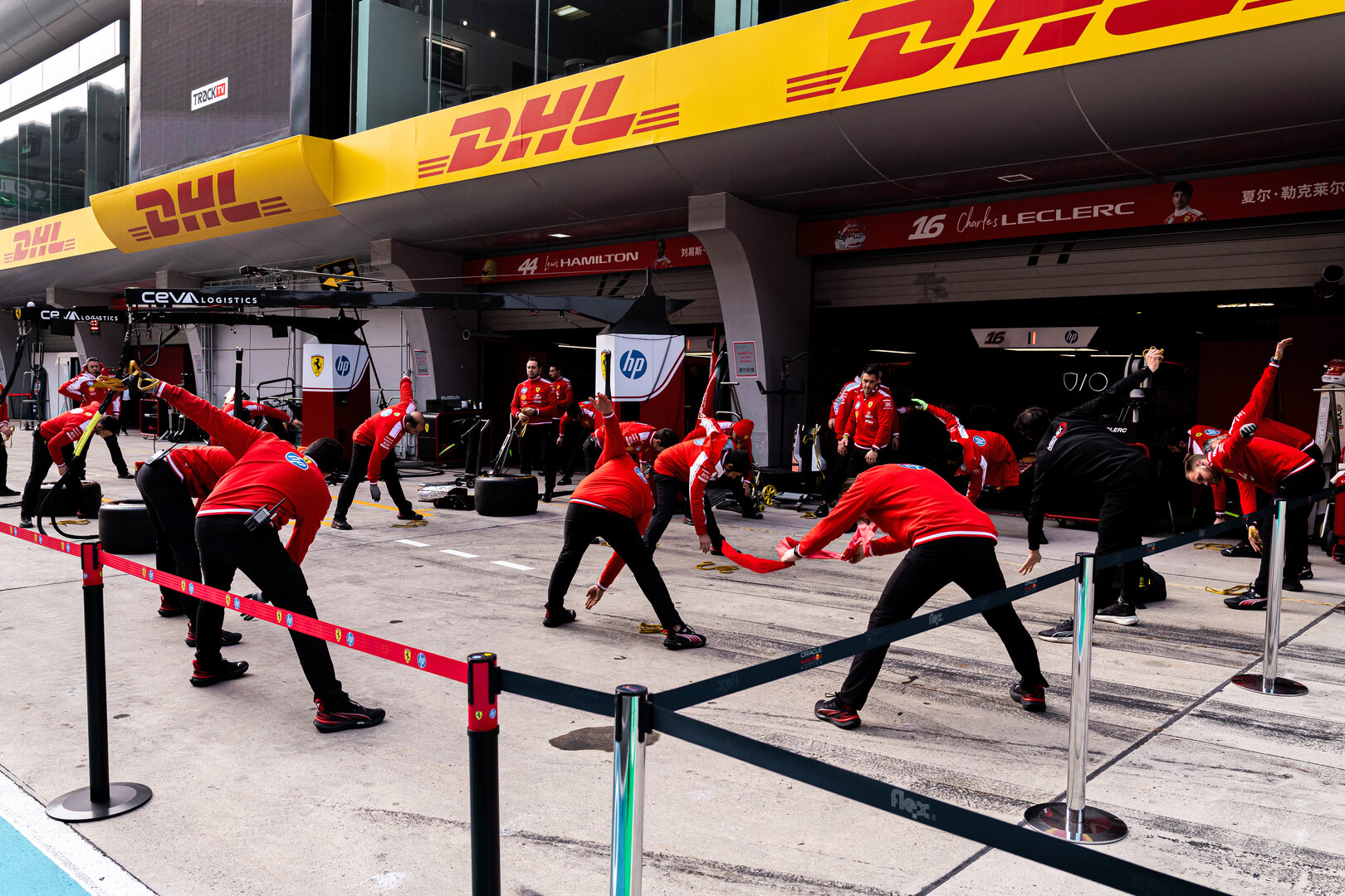 GP CINA, Ferrari meccanici exercise in the pits.
12.03.2026. Formula 1 World Championship, Rd 2, Chinese Grand Prix, Shanghai, China, Preparation Day.
- www.xpbimages.com, EMail: requests@xpbimages.com © Copyright: Denny / XPB Images
