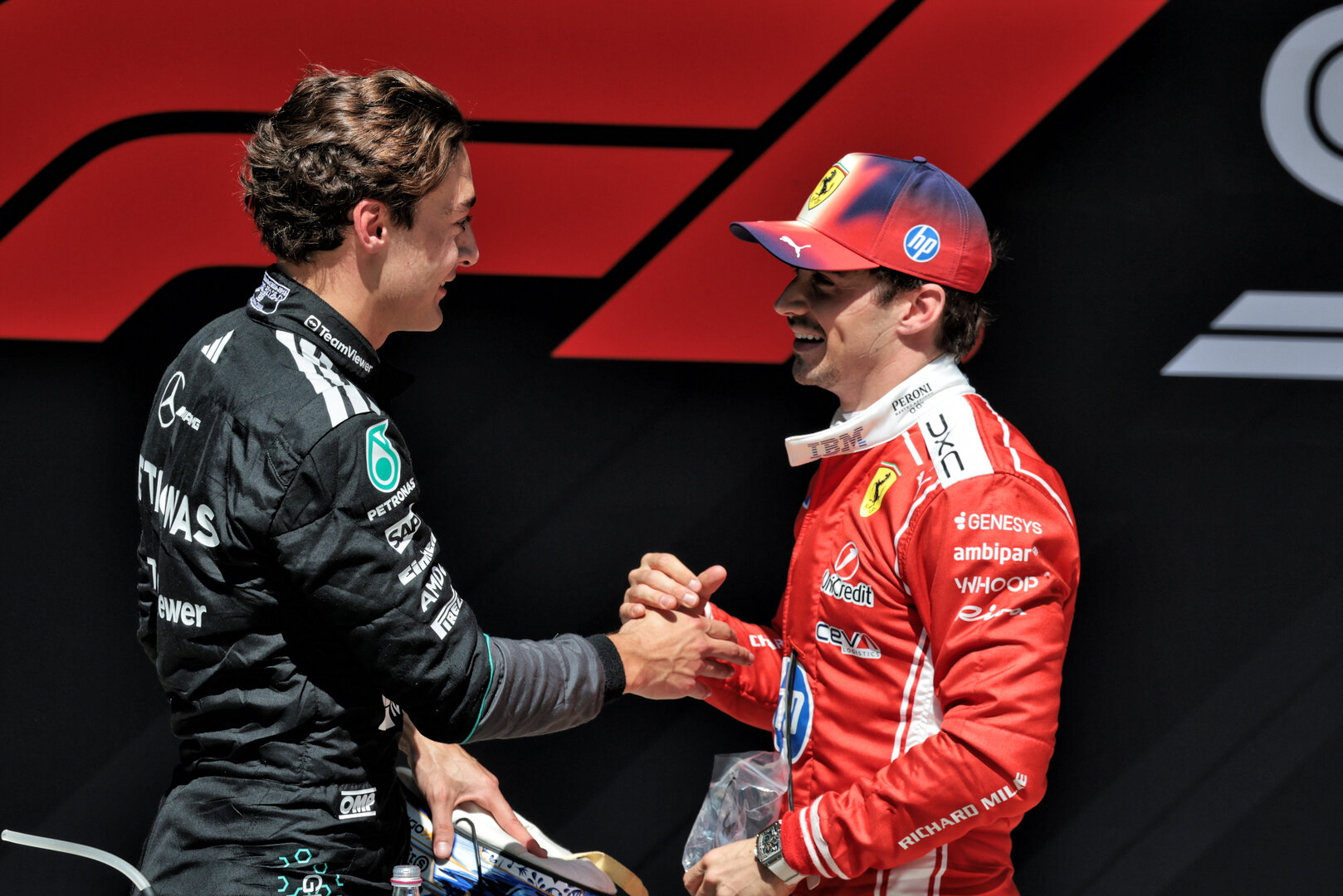 GP CINA, (L to R): Sprint winner George Russell (GBR) Mercedes AMG Formula One Team celebrates in parc ferme with second placed Charles Leclerc (MON) Ferrari.
14.03.2026. Formula 1 World Championship, Rd 2, Chinese Grand Prix, Shanghai, China, Sprint e Qualifiche Day.
- www.xpbimages.com, EMail: requests@xpbimages.com © Copyright: Moy / XPB Images