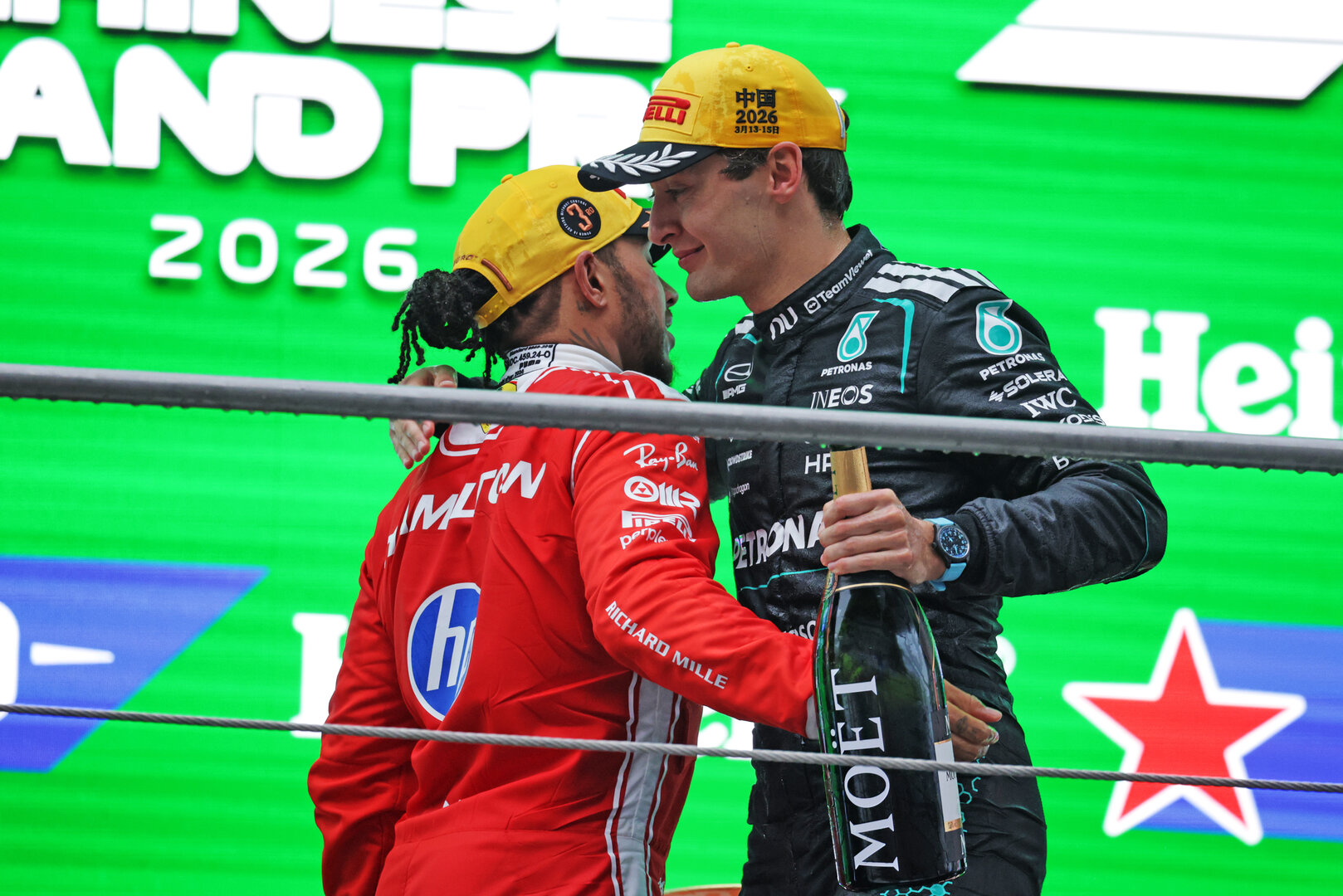 GP CINA, (L to R): third placed Lewis Hamilton (GBR) Ferrari celebrates with second placed George Russell (GBR) Mercedes AMG Formula One Team on the podium.
15.03.2026. Formula 1 World Championship, Rd 2, Chinese Grand Prix, Shanghai, China, Gara Day.
- www.xpbimages.com, EMail: requests@xpbimages.com © Copyright: Moy / XPB Images