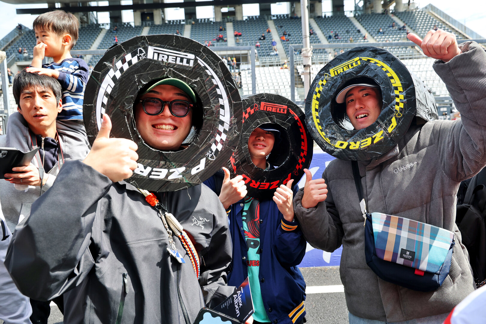GP GIAPPONE, Circuit Atmosfera - Pirelli fans in the pits.
26.03.2026. Formula 1 World Championship, Rd 3, Japanese Grand Prix, Suzuka, Japan, Preparation Day.
- www.xpbimages.com, EMail: requests@xpbimages.com © Copyright: Batchelor / XPB Images