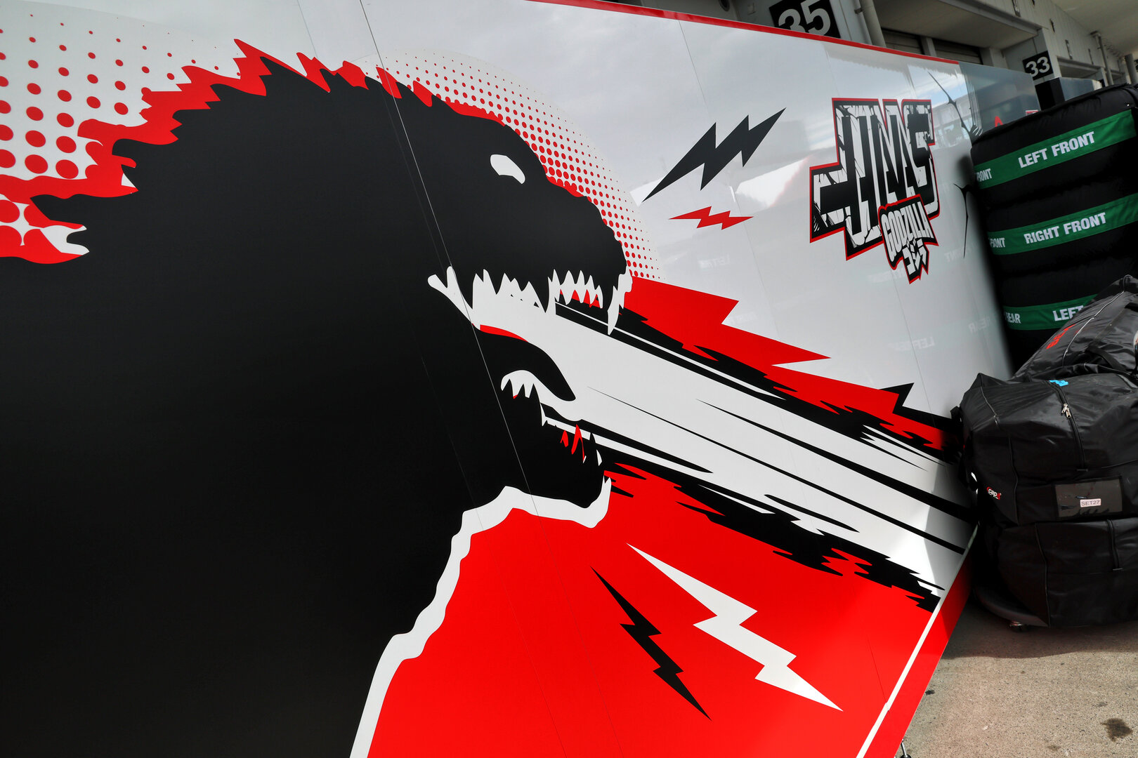 GP GIAPPONE, Haas F1 Team - Godzilla branding.
26.03.2026. Formula 1 World Championship, Rd 3, Japanese Grand Prix, Suzuka, Japan, Preparation Day.
- www.xpbimages.com, EMail: requests@xpbimages.com © Copyright: Batchelor / XPB Images