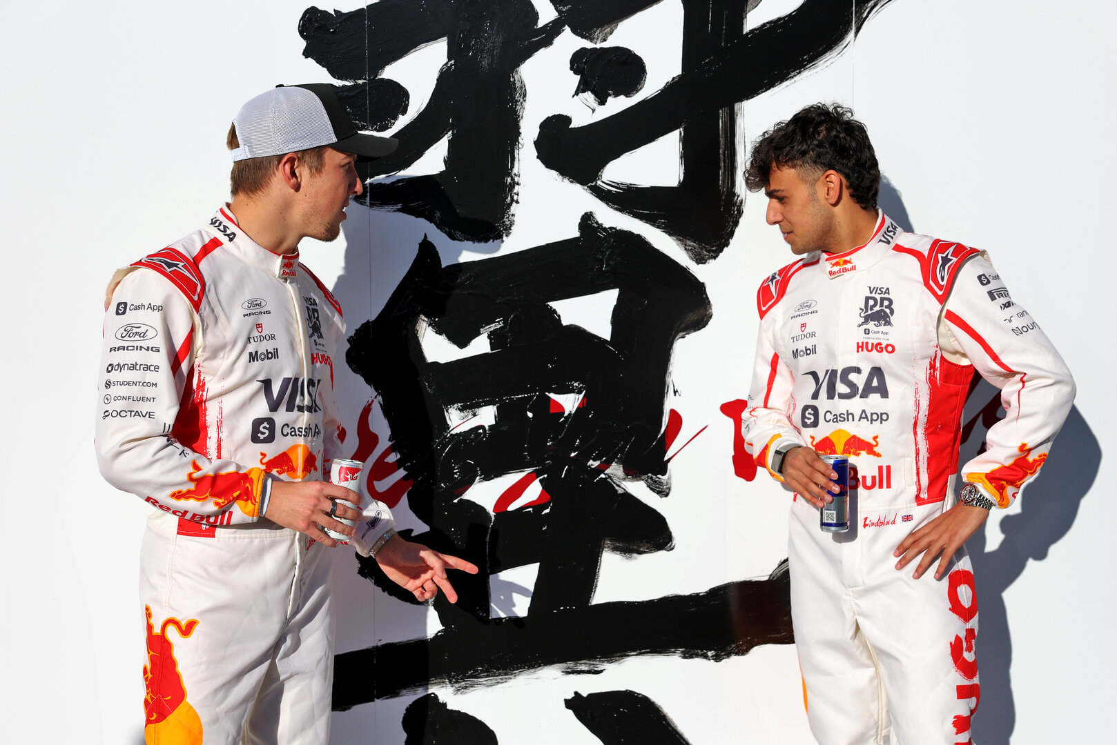 GP GIAPPONE, (L to R): Liam Lawson (NZL) Racing Bulls Formula One Team with team mate Arvid Lindblad (GBR) Racing Bulls Formula One Team.
26.03.2026. Formula 1 World Championship, Rd 3, Japanese Grand Prix, Suzuka, Japan, Preparation Day.
- www.xpbimages.com, EMail: requests@xpbimages.com © Copyright: Bearne / XPB Images