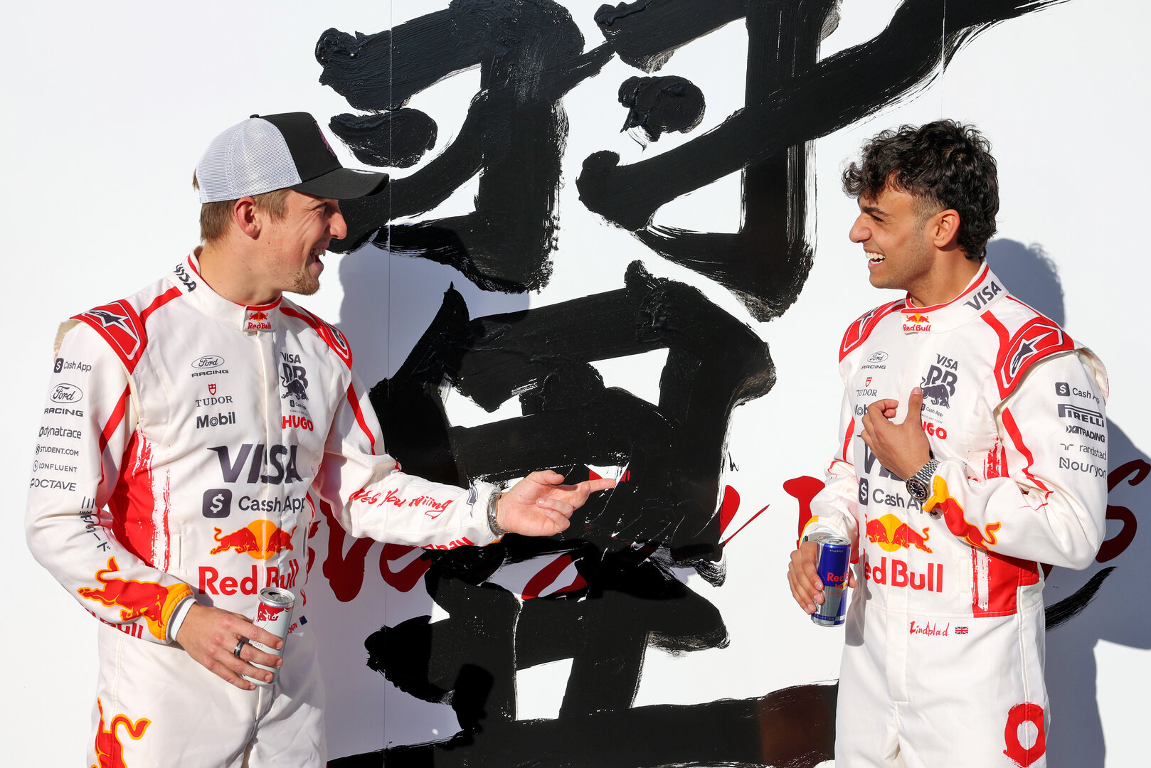 GP GIAPPONE, (L to R): Liam Lawson (NZL) Racing Bulls Formula One Team with team mate Arvid Lindblad (GBR) Racing Bulls Formula One Team.
26.03.2026. Formula 1 World Championship, Rd 3, Japanese Grand Prix, Suzuka, Japan, Preparation Day.
- www.xpbimages.com, EMail: requests@xpbimages.com © Copyright: Bearne / XPB Images