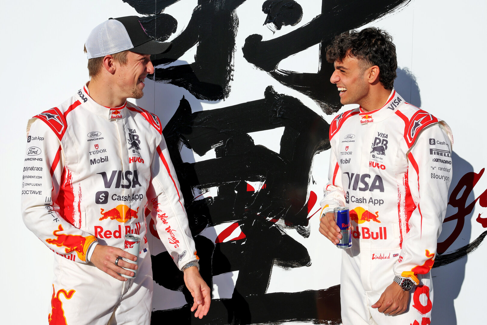 GP GIAPPONE, (L to R): Liam Lawson (NZL) Racing Bulls Formula One Team with team mate Arvid Lindblad (GBR) Racing Bulls Formula One Team.
26.03.2026. Formula 1 World Championship, Rd 3, Japanese Grand Prix, Suzuka, Japan, Preparation Day.
- www.xpbimages.com, EMail: requests@xpbimages.com © Copyright: Bearne / XPB Images
