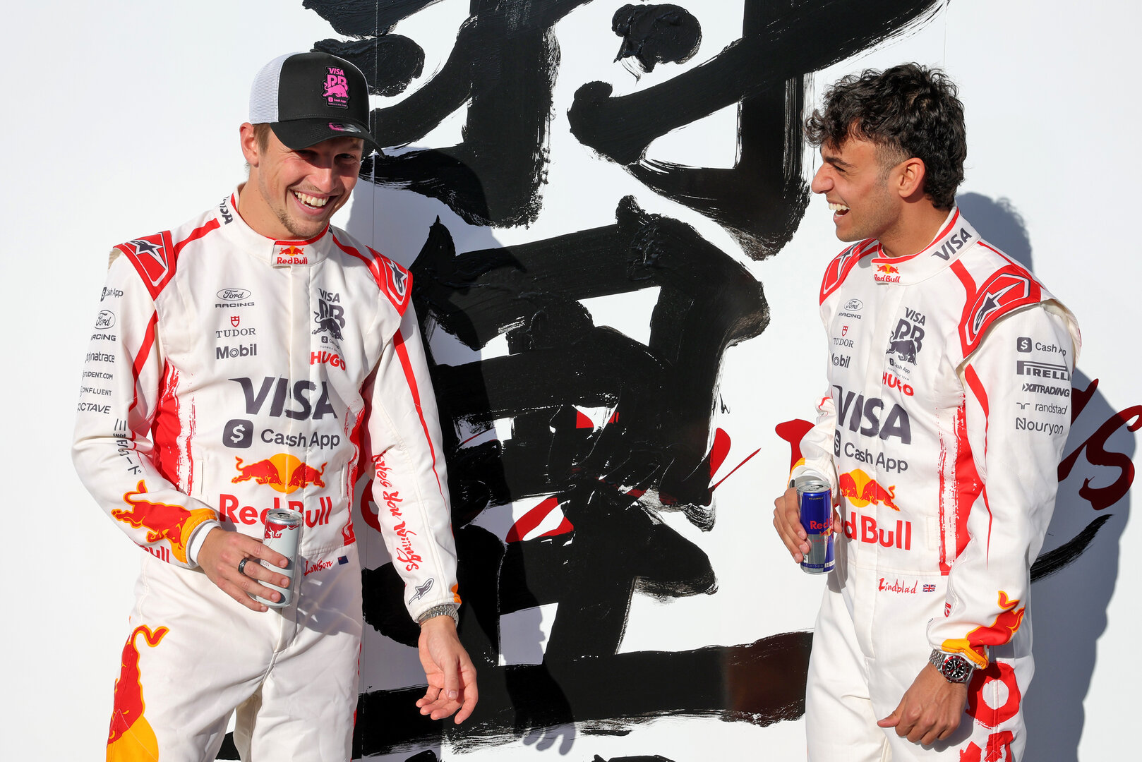 GP GIAPPONE, (L to R): Liam Lawson (NZL) Racing Bulls Formula One Team with team mate Arvid Lindblad (GBR) Racing Bulls Formula One Team.
26.03.2026. Formula 1 World Championship, Rd 3, Japanese Grand Prix, Suzuka, Japan, Preparation Day.
- www.xpbimages.com, EMail: requests@xpbimages.com © Copyright: Bearne / XPB Images