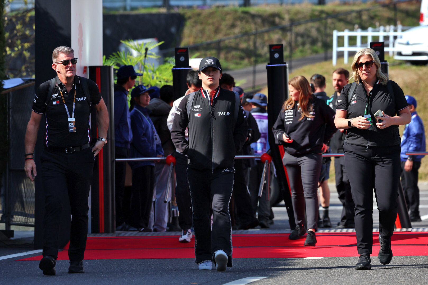 GP GIAPPONE, (L to R): Graeme Lowdon (GBR) Cadillac Formula 1 Team, Team Principal with Zhou Guanyu (CHN) Cadillac Formula 1 Team Reserve Driver e Laura Marchant (GBR) Cadillac Formula 1 Team Executive Assistant.
27.03.2026. Formula 1 World Championship, Rd 3, Japanese Grand Prix, Suzuka, Japan, Practice Day.
- www.xpbimages.com, EMail: requests@xpbimages.com © Copyright: Rew / XPB Images